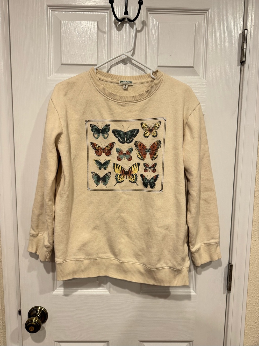 EARTHBOUND Cream Crewneck Sweatshirt with Colorful Butterfly Panel